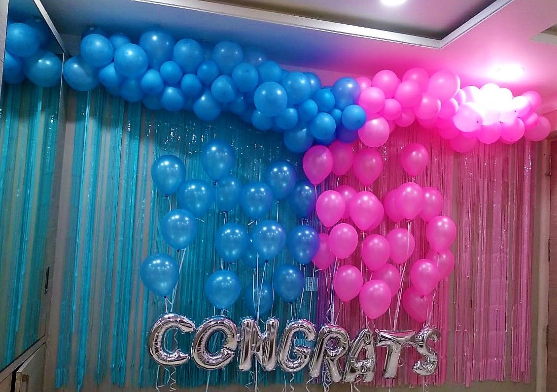 Foil backdrop with pink and Blue balloons