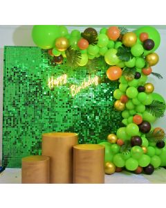 Glitter green backdrop with neon happy birthday light and organic balloons