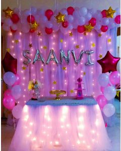Netted Backdrop withlights behind & buncheswith foil Letters