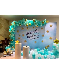 Flex backdrop with sea green and white balloon organic arch