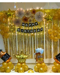 Gold foil curtain backdrop with foil columns &bunches