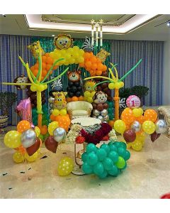 Kids jungle theme with animal foils and balloon wall backdrop